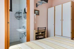 Koupelna v ubytování Hotel Sorriso