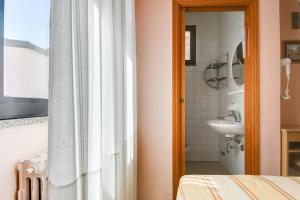 Koupelna v ubytování Hotel Sorriso