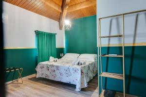 Hotel Sorriso tesisinde bir odada yatak veya yataklar