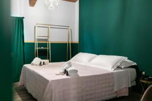 Postel nebo postele na pokoji v ubytování Hotel Sorriso