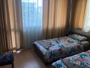 Кровать или кровати в номере Nesebar New Town Apartment