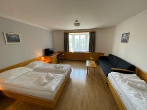 Postel nebo postele na pokoji v ubytování Hotel Laguna & restaurant
