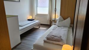 Postel nebo postele na pokoji v ubytování Ferienwohnung-Kormann
