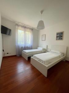Postel nebo postele na pokoji v ubytování Villa Ajna