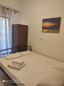 Postel nebo postele na pokoji v ubytování Sivota Rooms Athanasiou