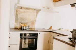 Kuchyň nebo kuchyňský kout v ubytování Landhaus K07