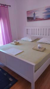 Posteľ alebo postele v izbe v ubytovaní Apartments Valiza III Large apartment - 3 bedrooms and parking space i Apartments Valiza IV