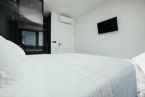 Postel nebo postele na pokoji v ubytování Apartment 1911