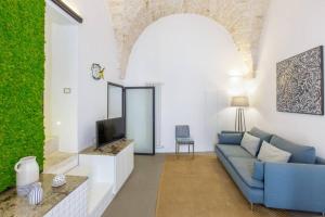 A television and/or entertainment centre at TORRE BIANCA VISTA MARE