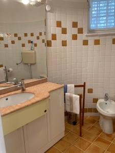 Koupelna v ubytování Goga Apartments + 88 fotografií