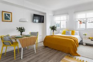Łóżko lub łóżka w pokoju w obiekcie Pop Art, Apartamentos de diseño en Arenal