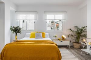 Łóżko lub łóżka w pokoju w obiekcie Pop Art, Apartamentos de diseño en Arenal