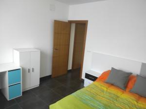 Posteľ alebo postele v izbe v ubytovaní Casa vacacional illa de arousa