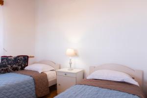 Postel nebo postele na pokoji v ubytování «MARMARA» house
