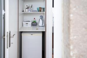 Kuchyň nebo kuchyňský kout v ubytování Viola rooms