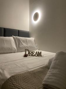 Ένα ή περισσότερα κρεβάτια σε δωμάτιο στο Levanda suites