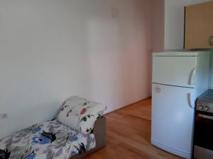 Kuchyň nebo kuchyňský kout v ubytování Apartmani Ivan