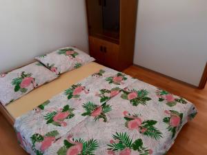 Postel nebo postele na pokoji v ubytování Apartmani Ivan