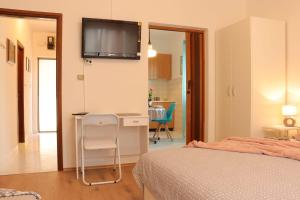Postel nebo postele na pokoji v ubytování Cozy Apartments Danica Novalja - Ground floor