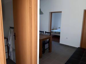 Postel nebo postele na pokoji v ubytování Apartmani Ivan