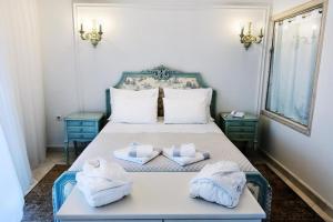 
A bed or beds in a room at Viva Mare Hotel & Spa
