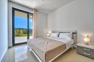 Posteľ alebo postele v izbe v ubytovaní Silver + 37 fotografií