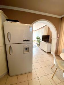 Kuchyňa alebo kuchynka v ubytovaní Do-Ti Apartmanház Balatonlelle