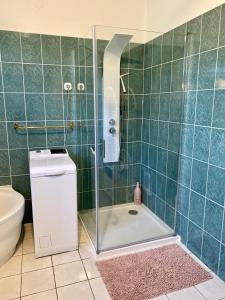 Kúpeľňa v ubytovaní Do-Ti Apartmanház Balatonlelle