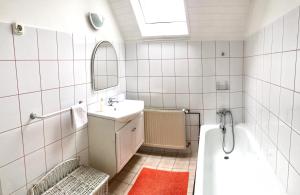 Kúpeľňa v ubytovaní Do-Ti Apartmanház Balatonlelle