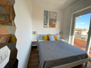 Кровать или кровати в номере B&b Animo Mediterraneo