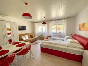 Posteľ alebo postele v izbe v ubytovaní Do-Ti Apartmanház Balatonlelle
