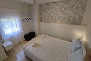 Postel nebo postele na pokoji v ubytování Vatos 2 bedroom apartment