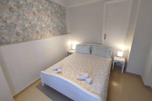 Postel nebo postele na pokoji v ubytování Vatos 2 bedroom apartment
