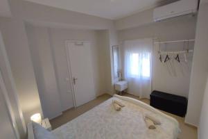 Postel nebo postele na pokoji v ubytování Vatos 2 bedroom apartment