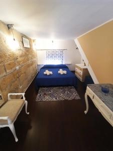 Katil atau katil-katil dalam bilik di Casa Liò +24 gambar