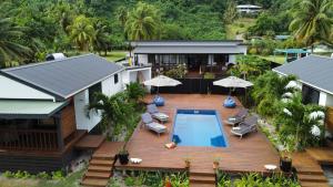 Výhľad na bazén v ubytovaní Abera's Aitutaki Villas alebo v jeho blízkosti