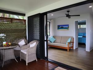 Posezení v ubytování Abera's Aitutaki Villas