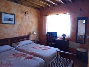 Postel nebo postele na pokoji v ubytování Casa Maria