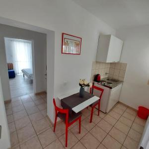 Kuchyň nebo kuchyňský kout v ubytování Apartments Villa Antony