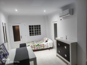 Postel nebo postele na pokoji v ubytování Apartamentos avda juan Carlos