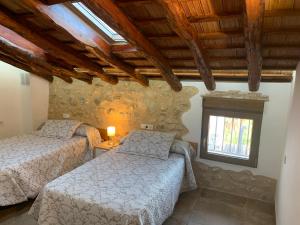 Postel nebo postele na pokoji v ubytování Casa Inés