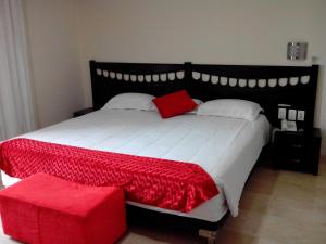 Postel nebo postele na pokoji v ubytování Hotel Suite Continental
