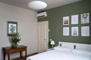 Postel nebo postele na pokoji v ubytování PODERE IL QUADRO + 37 fotografií