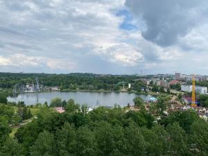 a view of a large lake in a city at Comfortable Apartament in Katowice