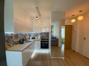 Kuchyňa alebo kuchynka v ubytovaní Apartament Swing
