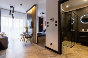 Posteľ alebo postele v izbe v ubytovaní Apartament Nadmotławie 34