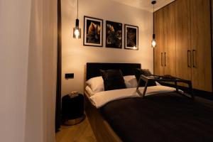 Posteľ alebo postele v izbe v ubytovaní Apartament Nadmotławie 34