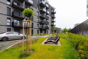 Vonkajšia záhrada v ubytovaní Apartament Nadmotławie 34