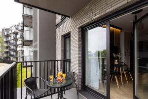 Balkón alebo terasa v ubytovaní Apartament Nadmotławie 34