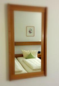 Postel nebo postele na pokoji v ubytování Hotel Merian Rothenburg